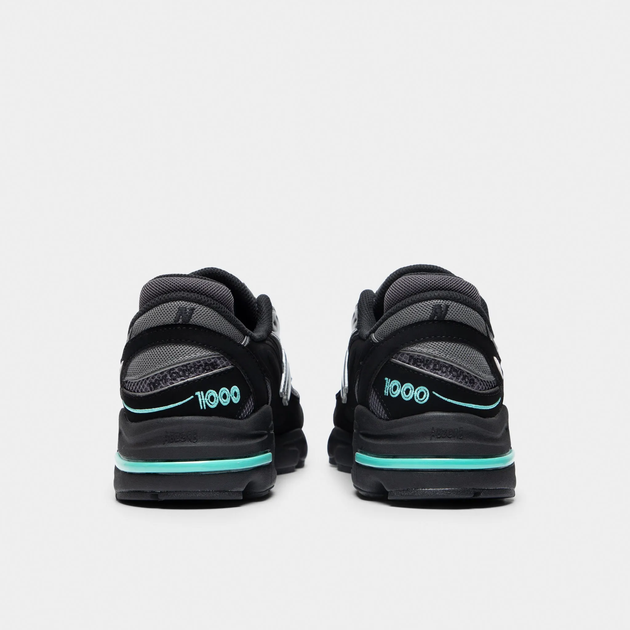 New Balance M1000 Black / Teal Soft Upper