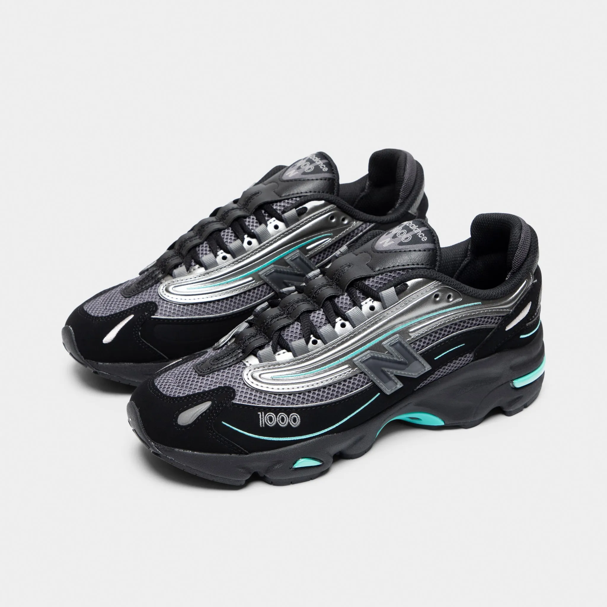 New Balance M1000 Black / Teal Responsive