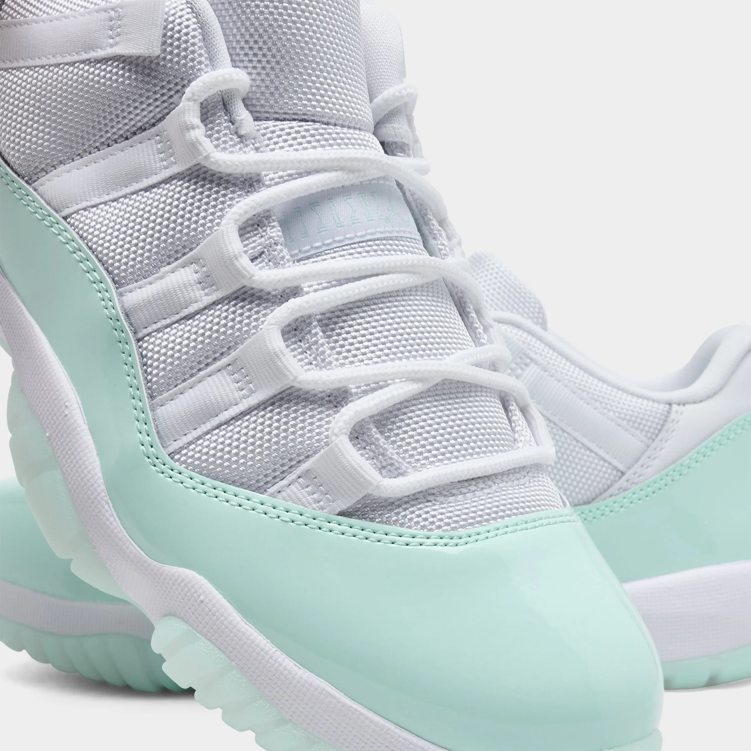 Jordan Women's 11 Retro Low White / Igloo Mid