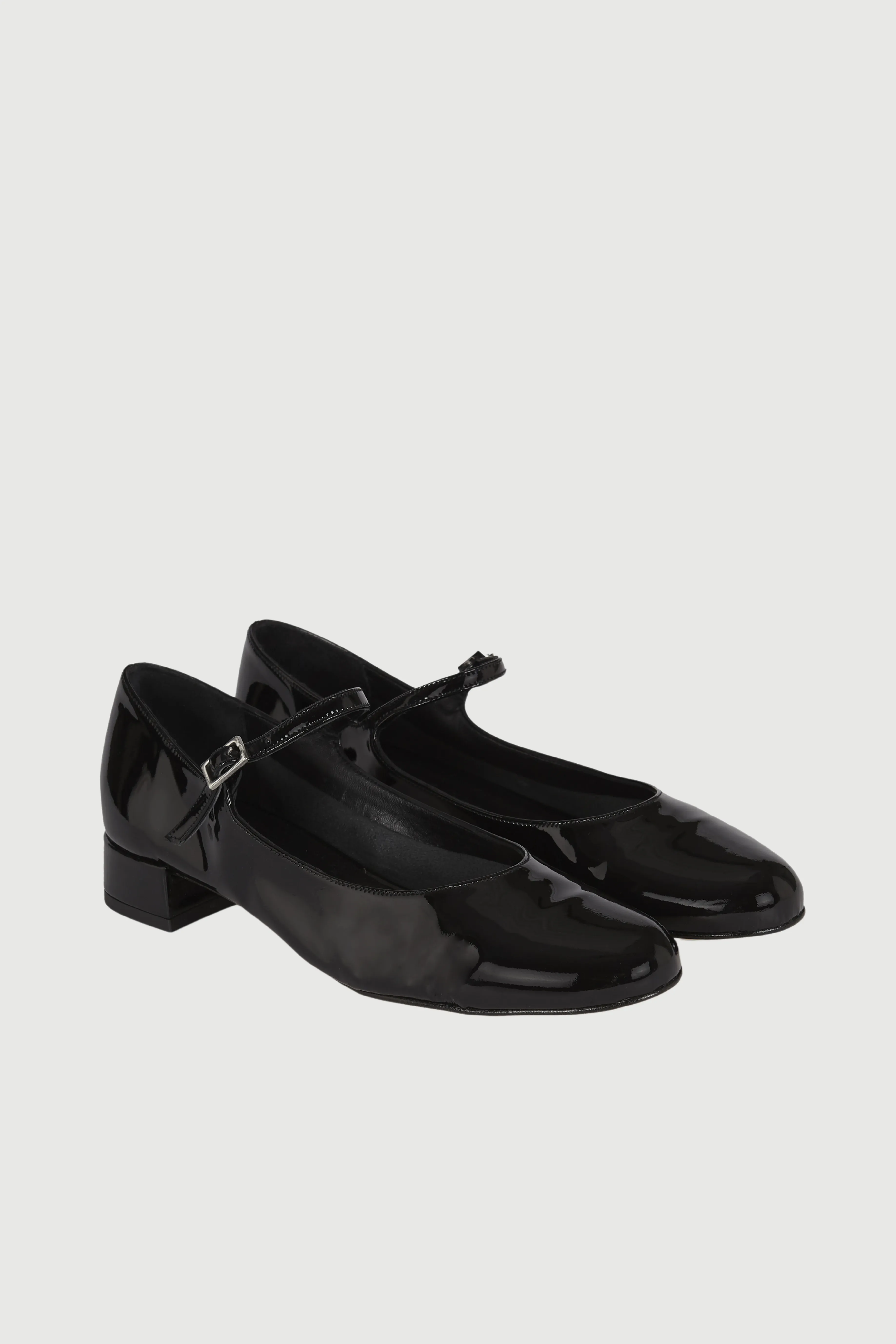 crew neck Emilia Mary Janes in Black Patent Leather