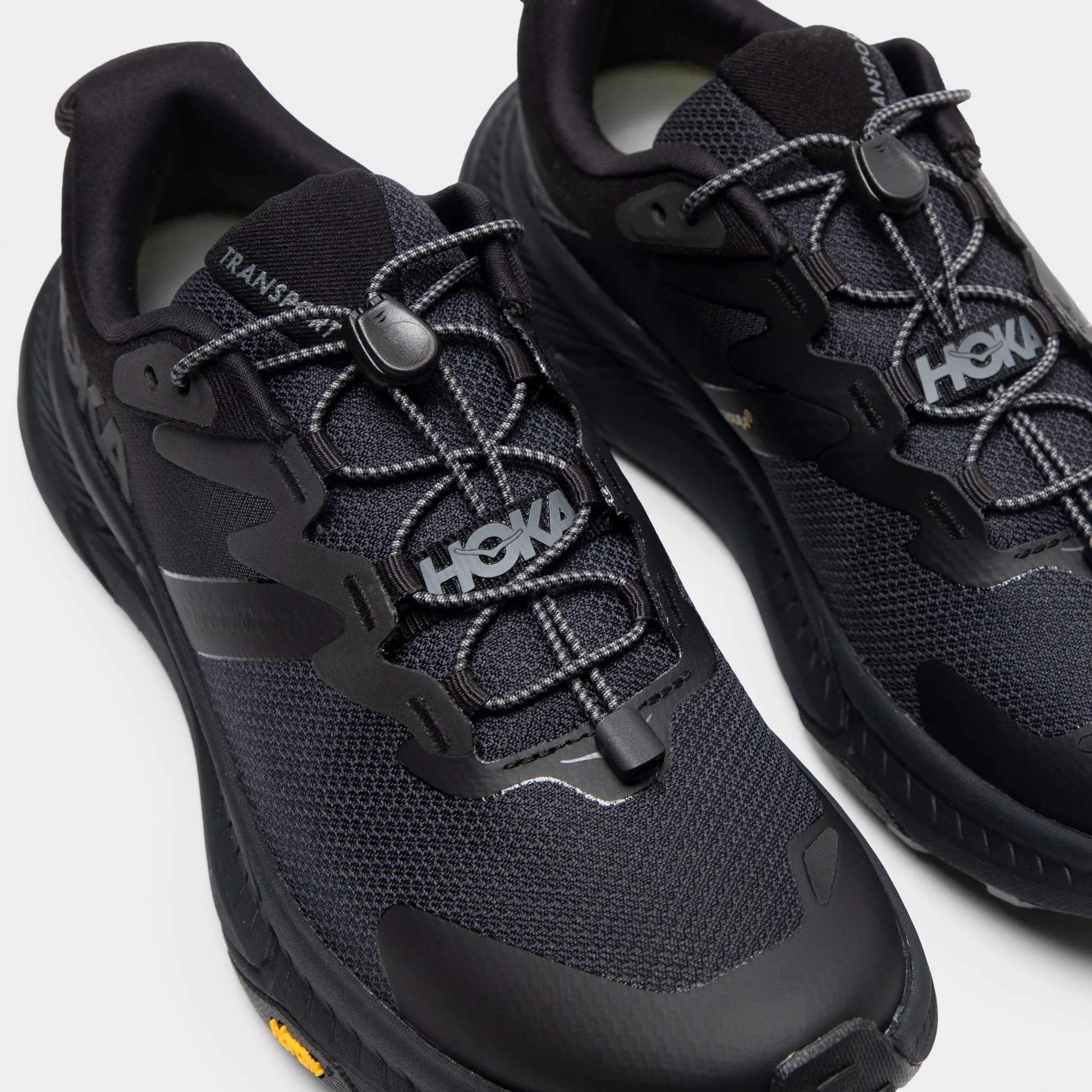 Hoka Women's Transport Black / Black Heat Dissipation Channels
