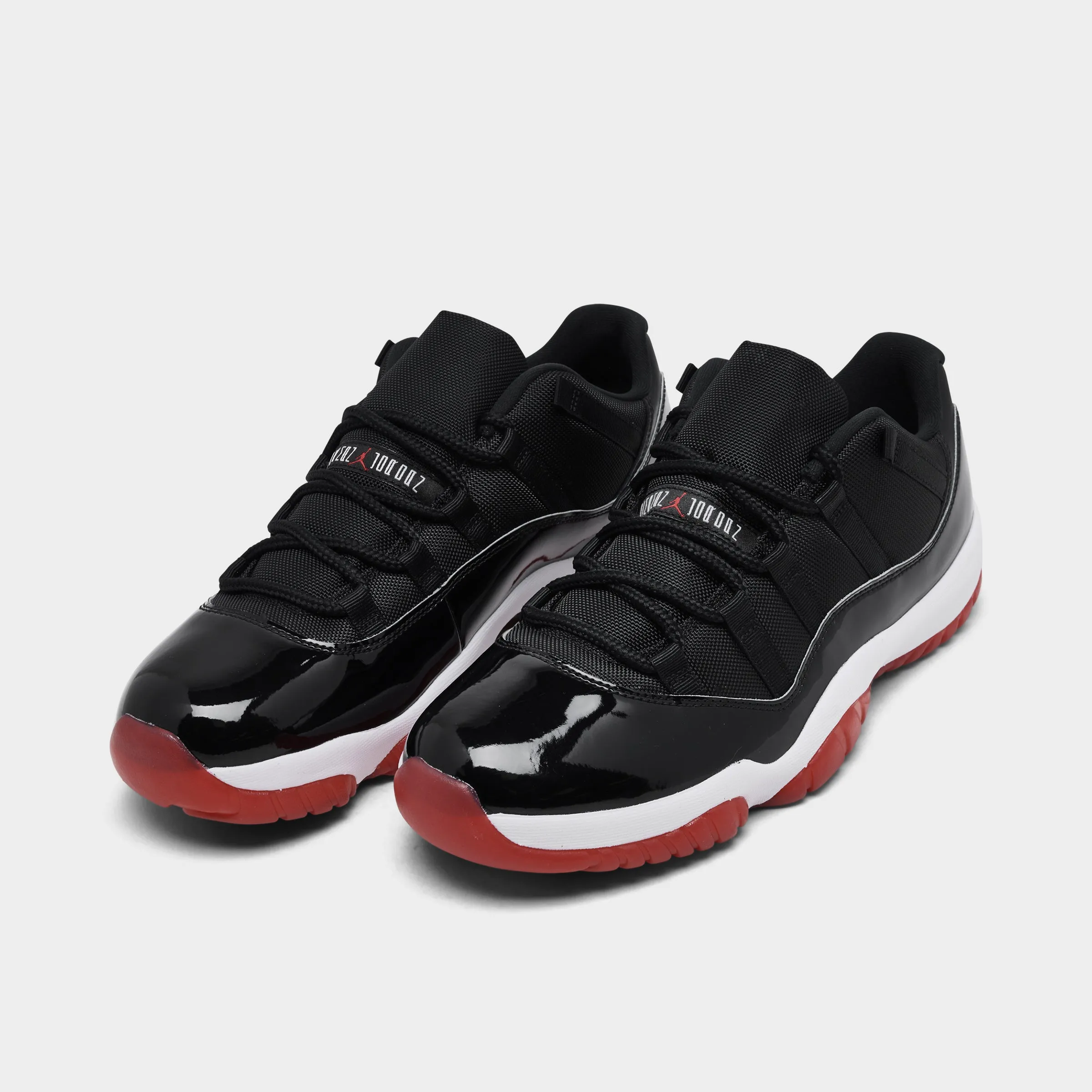 Jordan 11 Retro Low Black / Varsity Red - White Torsion Control Groove Vapor Release Fabric