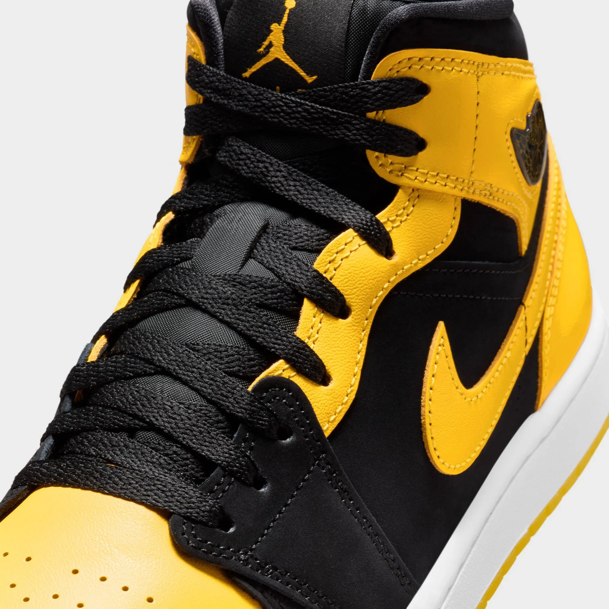 Jordan 1 Mid Black / Varsity Maize - White Impact Resistant Toe Guard Move Swiftly