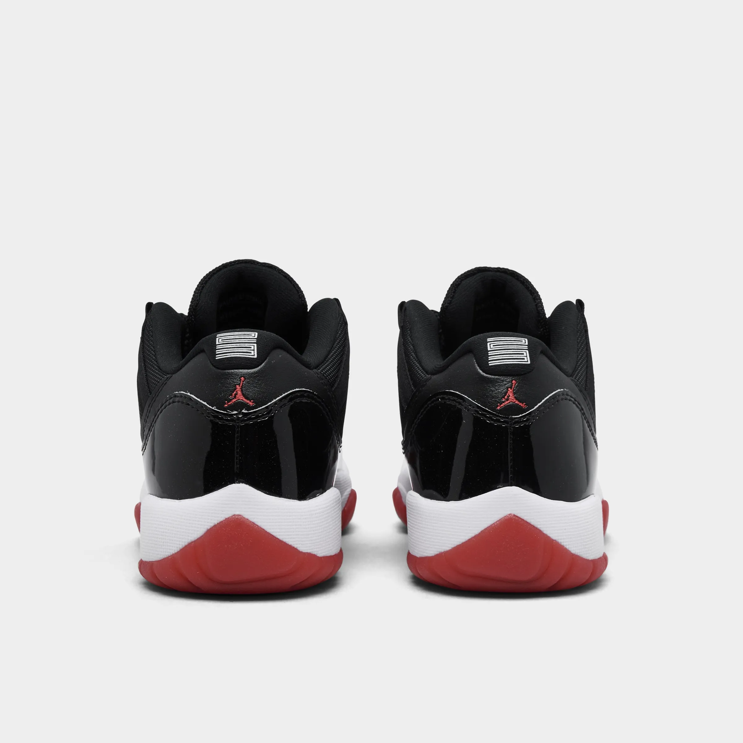 Energy Retention Jordan 11 Retro Low GS Black / Varsity Red - White