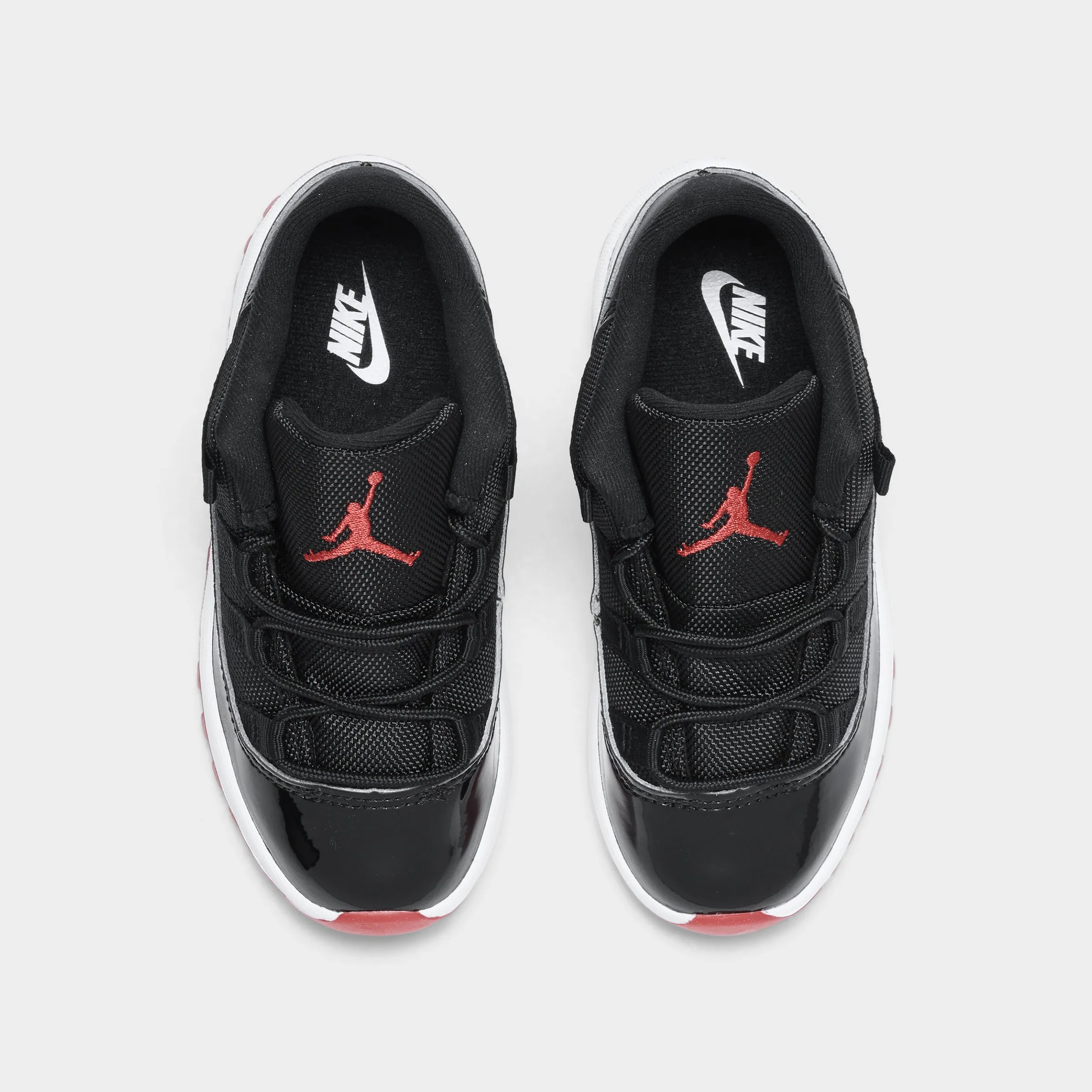 Jordan 11 Retro Low TD Black / Varsity Red - White Endurance Power Champion Feel