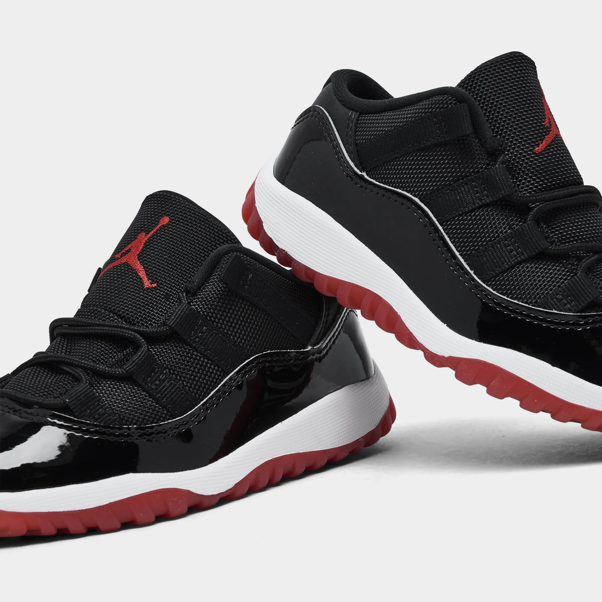 Jordan 11 Retro Low TD Black / Varsity Red - White Active Fit Strong Core