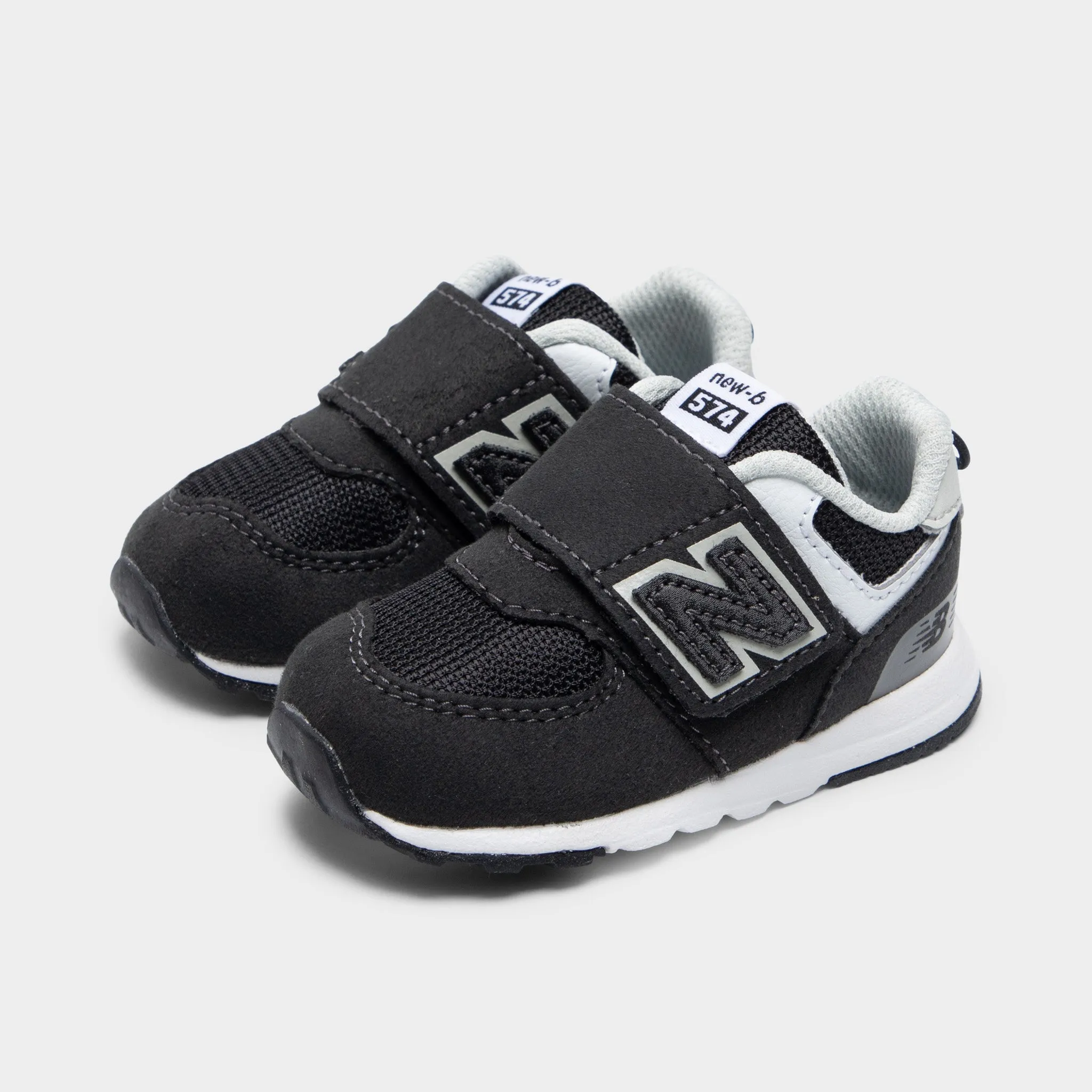 New Balance Infants' 574 Black / White martial artists football players' protection