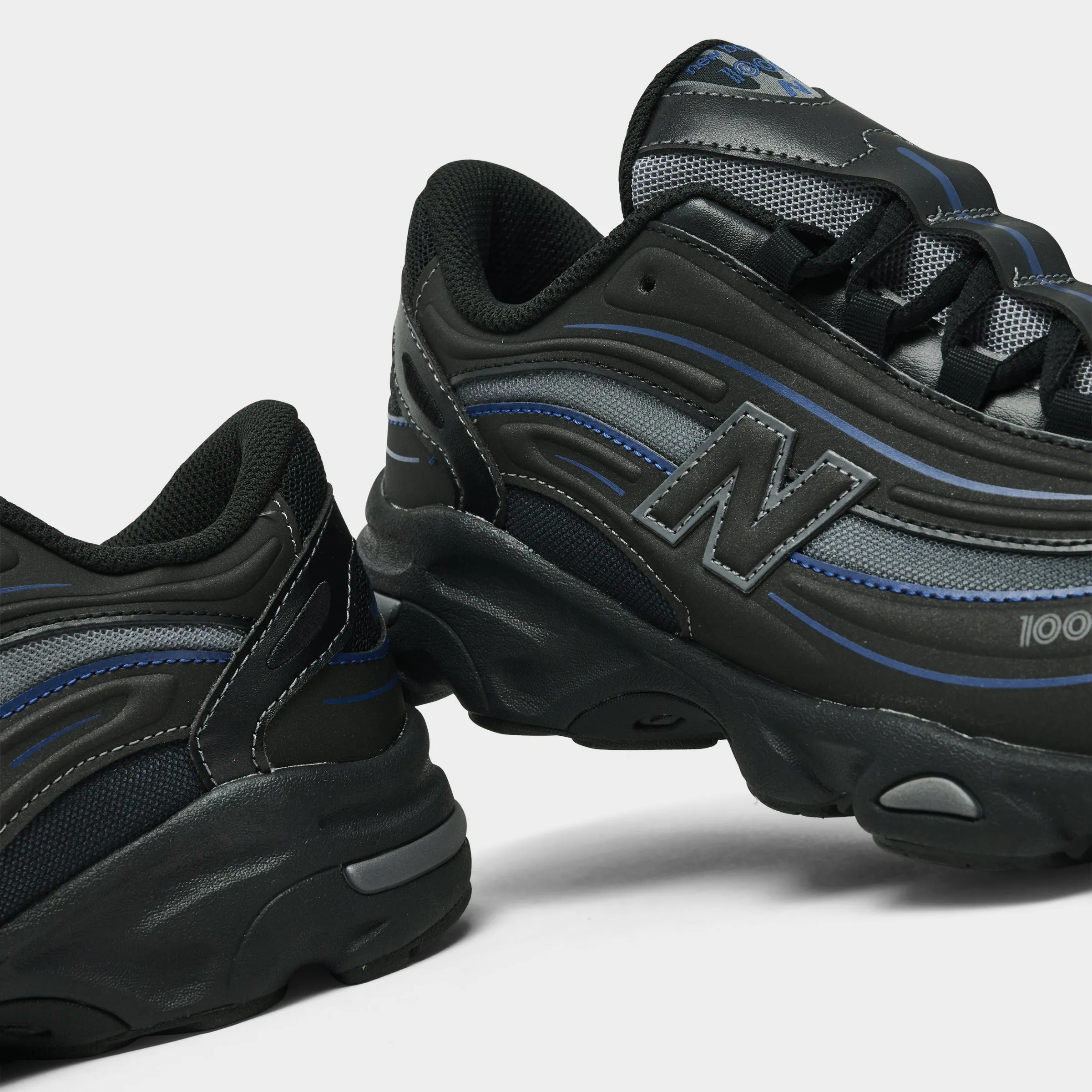 gentle touch Foam Support New Balance Juniors' 1000 Black / Galaxy Blue
