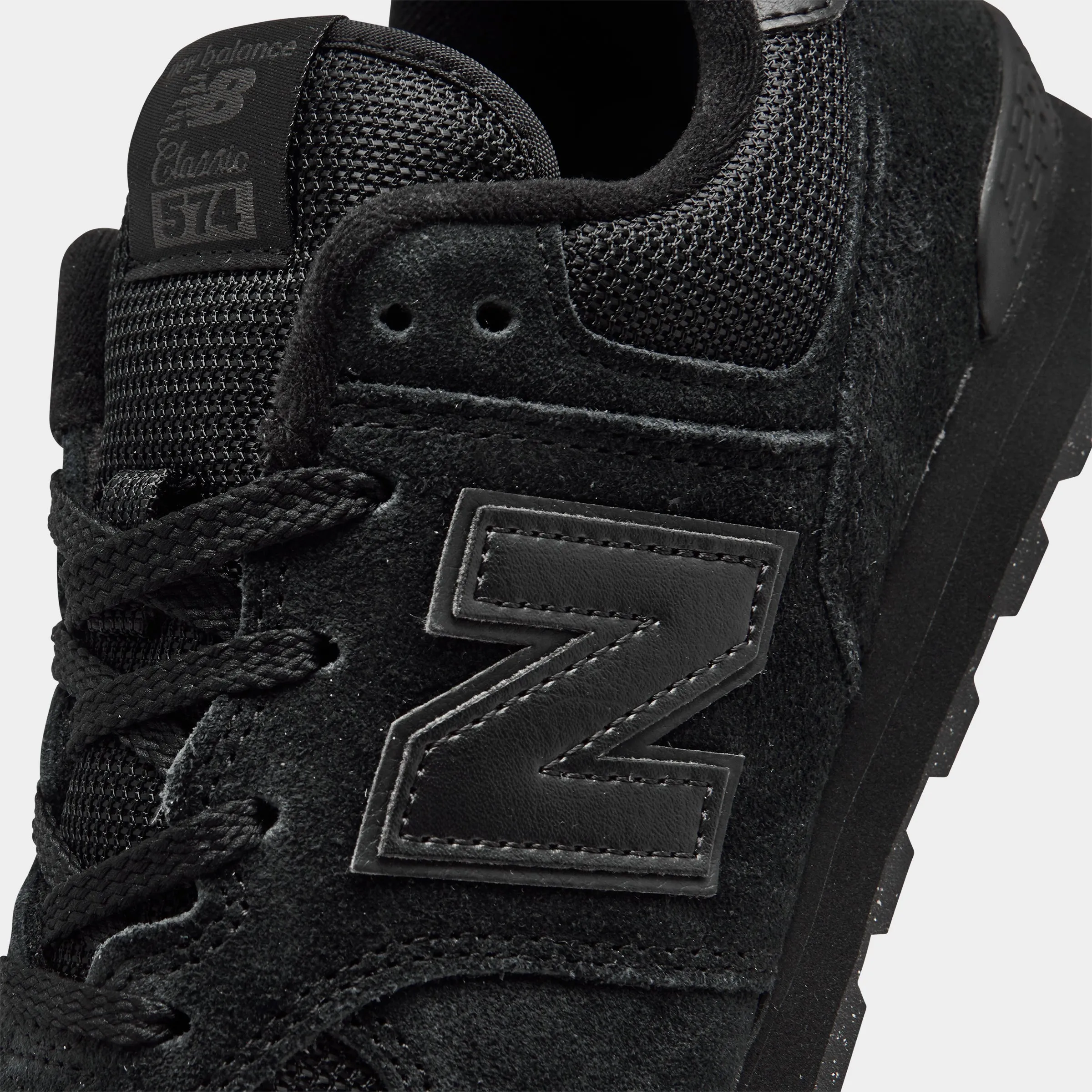 New Balance Juniors' 574 / Black Iconic shock absorption