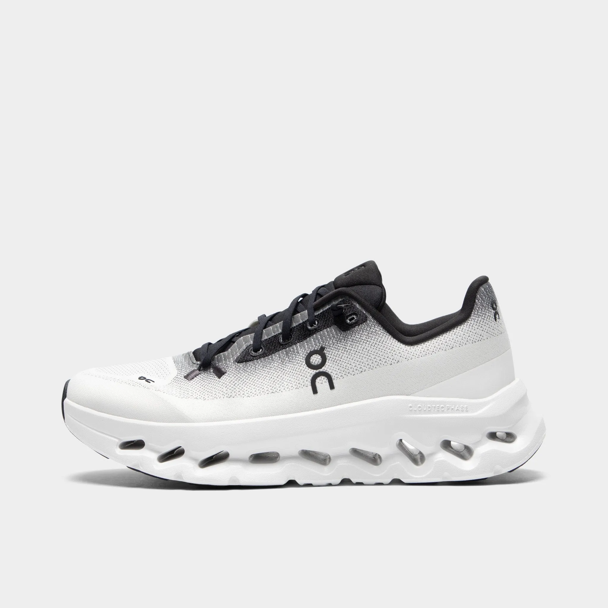 On Cloudtilt Black / Ivory Bouncy midsole