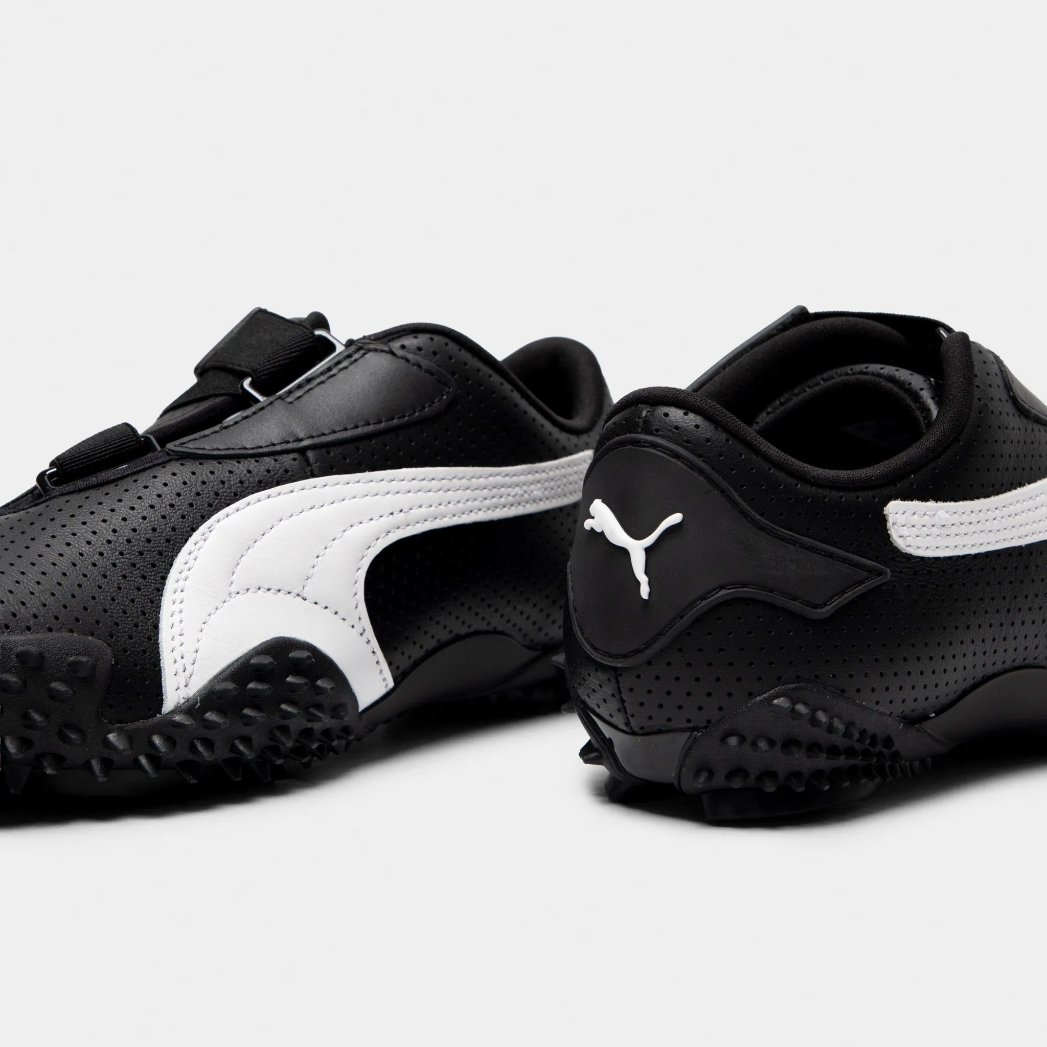 PUMA Women's Mostro Perf Black / White Dynamic Heel Counter Fast Outing