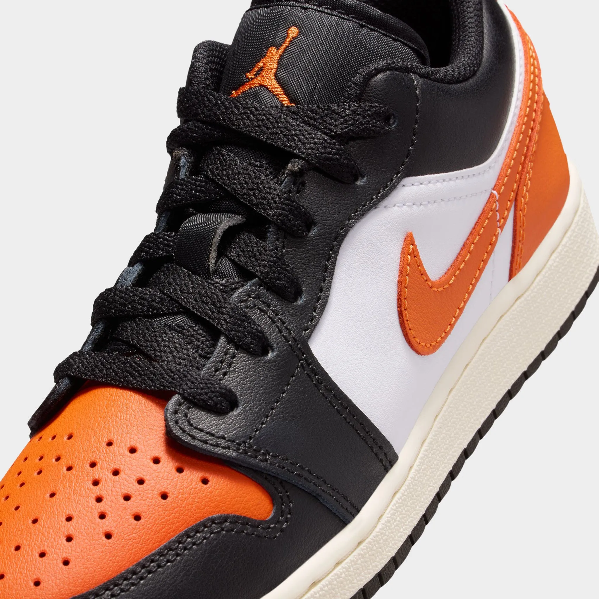 Seamless construction Jordan 1 Low GS Black / Starfish - White