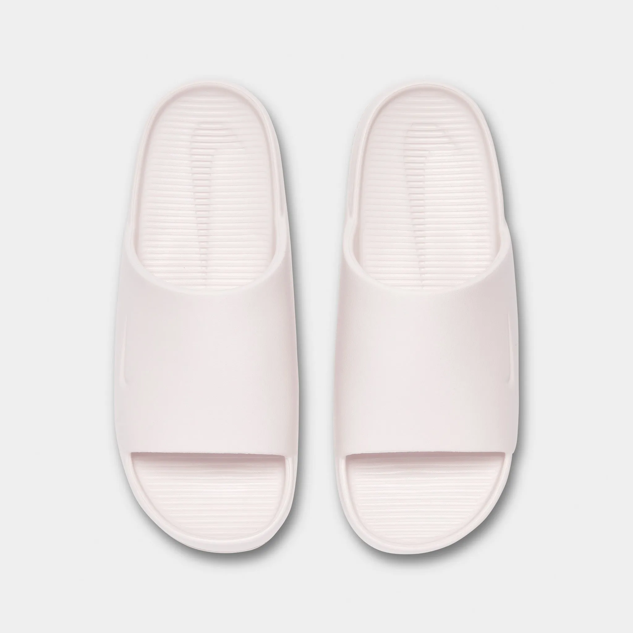 Supportive support Strong Stride Nike Women's Calm Slide / Barely Rose
